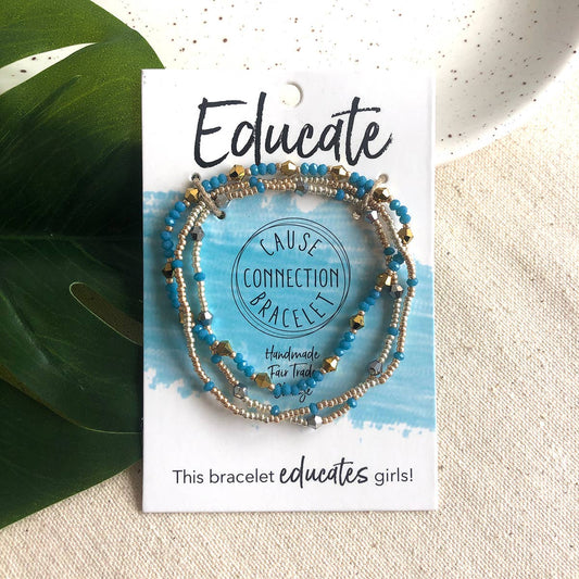 Blue Educate Cause Connection handmade fair trade bracelet on packaging that supports education for girls and dignified work.